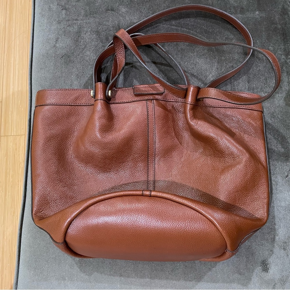 Fossil purse tote. First photo does not have a stain, just a shadow.